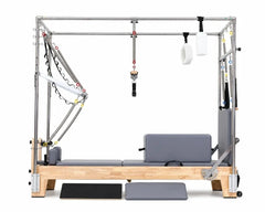 DZ132FT-1 commercial oak Pilates reformer with full tower, front view