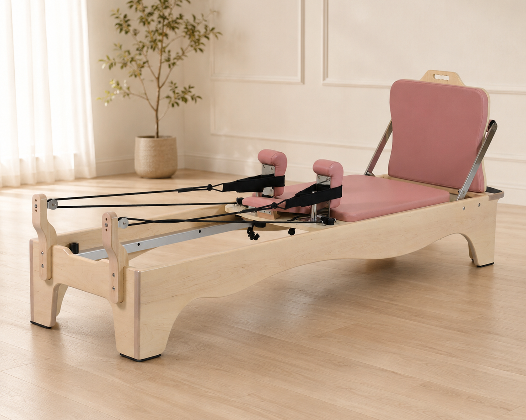 DZ184 maple Pilates reformer in a premium studio setting